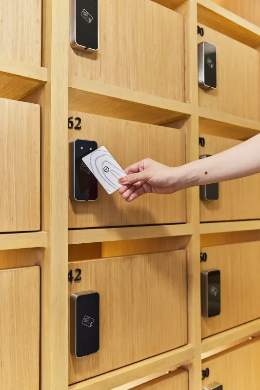 A key card held to a mailbox